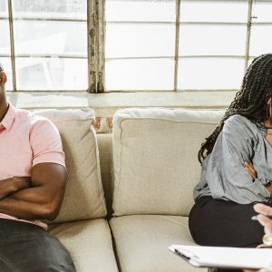 Black couple having a marriage counseling with therapist